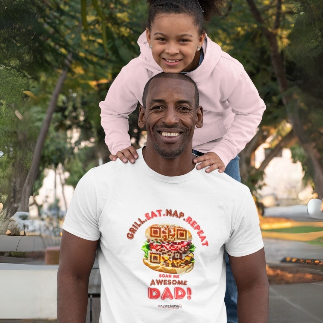 Dad in a white shirt with a burger QR code design and the slogan “Grill. Eat. Nap. Repeat. Scan Me, Awesome Dad,” posing with his daughter.